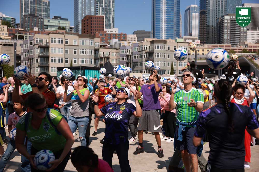 Seattle set a Guinness World Record for participants in a soccer clinic when 1,038 individuals crowded onto Pier 62 on June 16, 2025. (Maddy Grassy/Sounders FC)